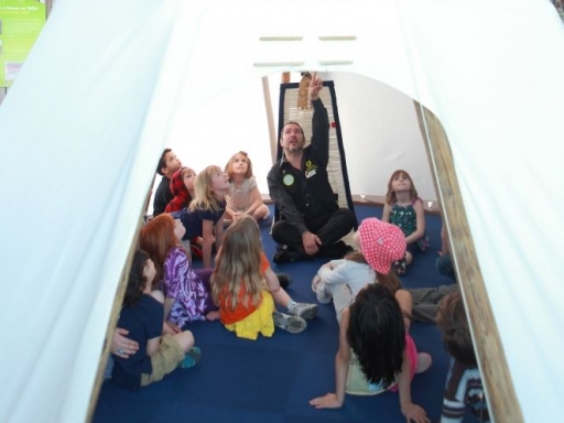 kids in a tipi.