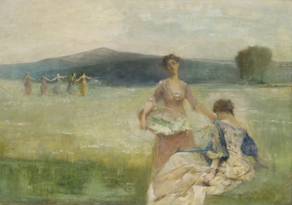 women dancing in a field in spring